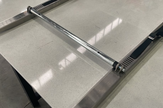 Motorcycle wheel rolling across the Alien Ramp Tailgate Roll Plate
