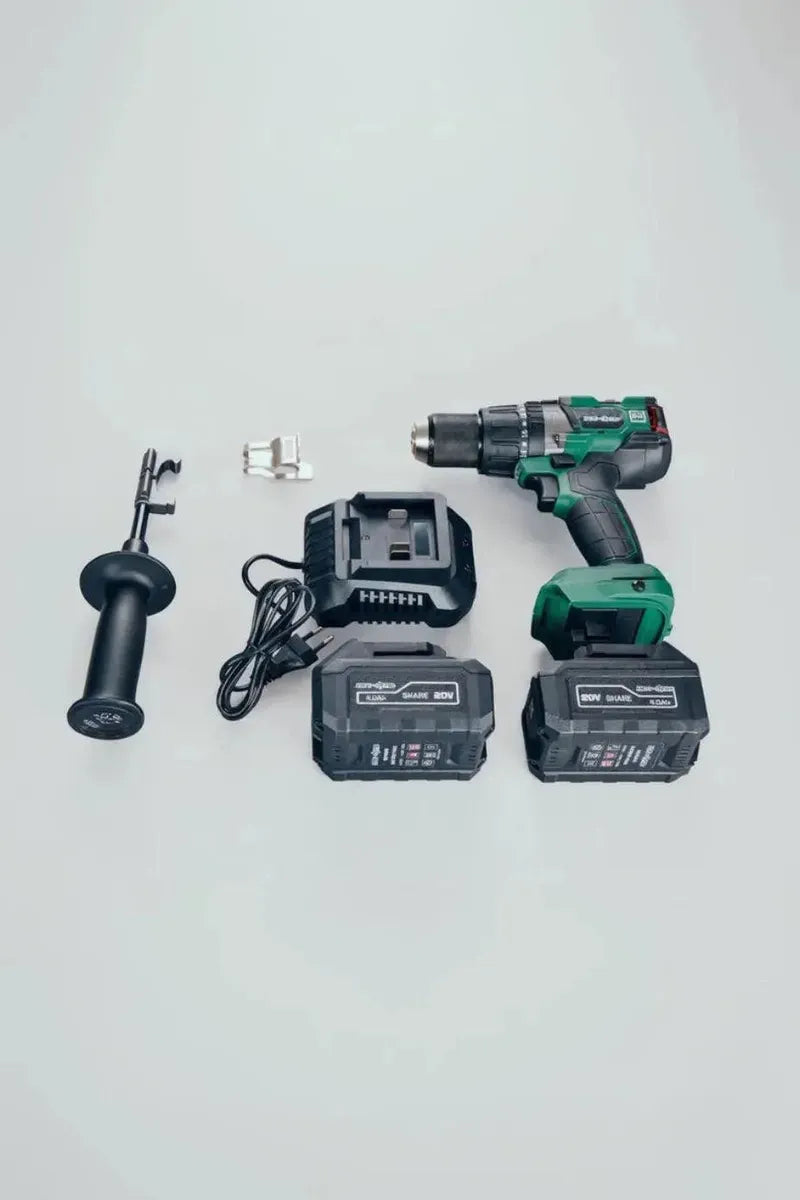 Green Neo-Dyne cordless drill with battery and accessories on a white background